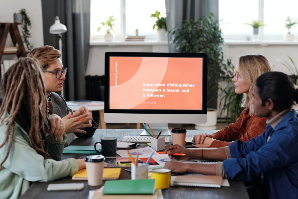 an image showing two individuals from different cultural backgrounds engaged in a conversation, with body language illustrating the importance of non-verbal cues